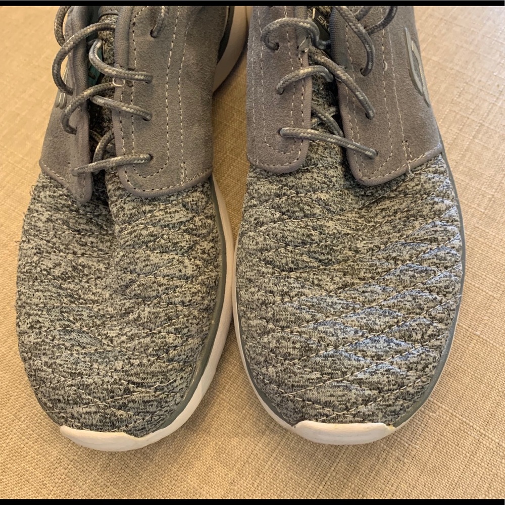 Gray Sketchers tennis shoes